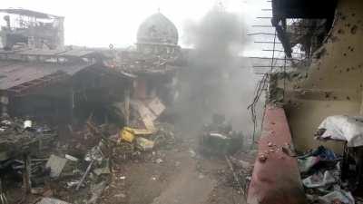 Philippine Army M113 with improvised add-on armor gets hit by an RPG and survives (Marawi 2017)