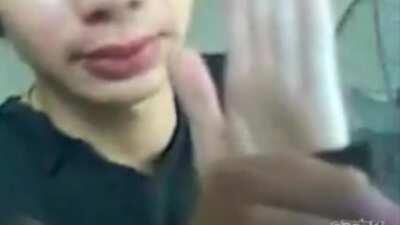 Asian Man Tases himself.