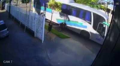 Guy gets ran over by bus