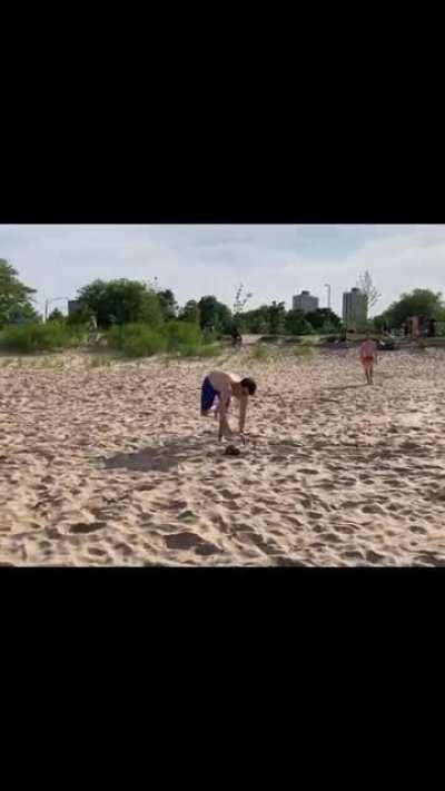 Guy throws football at someone behind the camera