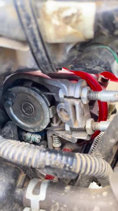 Is this slack in my return cable causing my sticky throttle return?