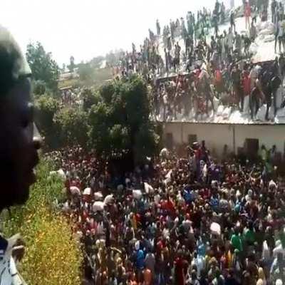 Nigerians raid a government-operated coronavirus relief warehouse full of rice, corn, and pasta