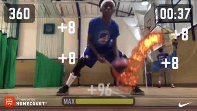 Young basketballer practices his dribbling skills with an interactive game