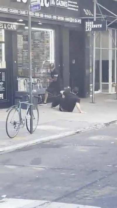 Man pulls out a taser during fight in soho