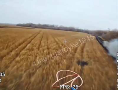 A Russian fibre-optic FPV-drone closing in on a Ukrainian Stryker ICV watches it take a hit from a Lancet and keep going, Kursk Oblast