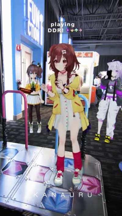 Korone tries to impress a cat and god with her DDR skills