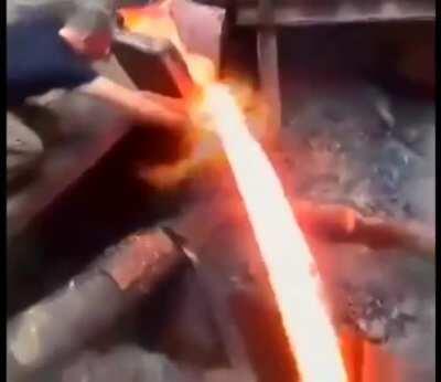 This is - How to swipe your hands through molten metal lava.
