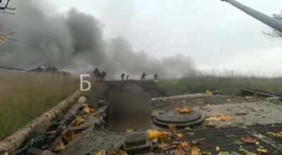 A Russian bmp-2 carrying troops hitting a mine in eastern Ukraine.
