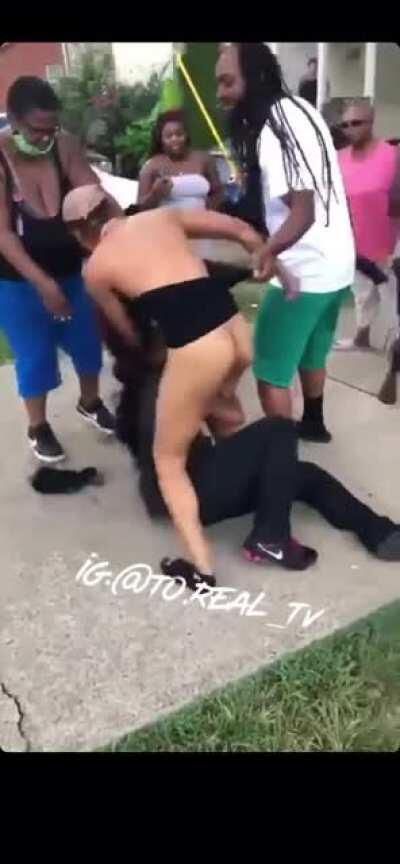 White shirt girl in the beginning of the video ends up knocked out (can see her on top of the steps around 1:19)