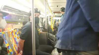 Dude films the inside of a bus full of rioters in plastic handcuffs including himself who were taken in by police and brought to a building with a bunch of other rioters in Los Angeles