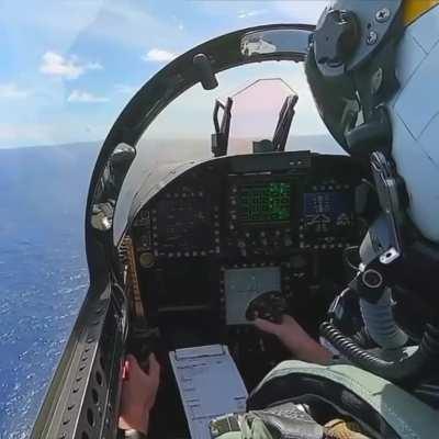 F-18 Jet launches for a strafe run