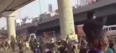 Brave Delhi police 💪🏽 brutally beating an emergency medical worker with batons during republic day. The bright best worn by medical workers is seen. (The same medical workers treated police as well, yet they were not even spared.)