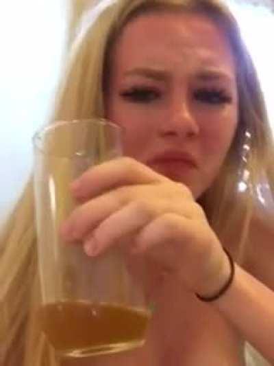 Girl attempts to drink her own pee and ends up vomiting