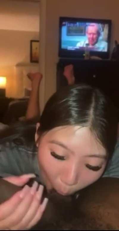 Asian thottie in training tries her best to fit anything in her mouth.