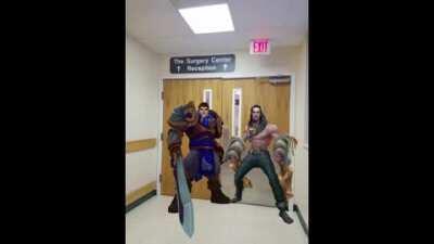 Gayren and Sylass waiting outside the delivery room while Luxanal is giving birth