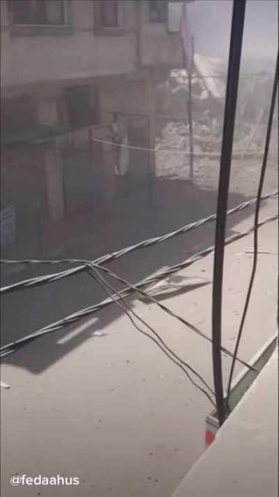 Palestinian family hides in fear as bombs explode all around their neighborhood