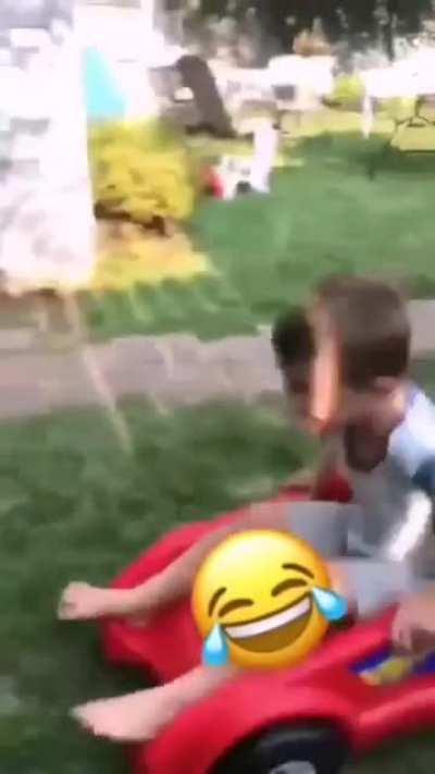 Kid forgets to duck parking toy car