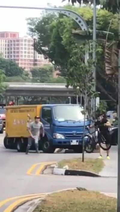 Truck Driver trys to run over cyclist. Gets what he deserves