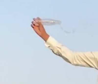 How to open a bottle of water by AK47.