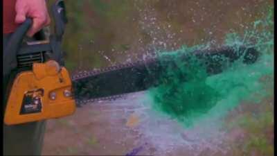 Chainsaw Popping a Water Balloon.