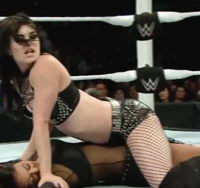 Paige Straddles an unconscious Layla