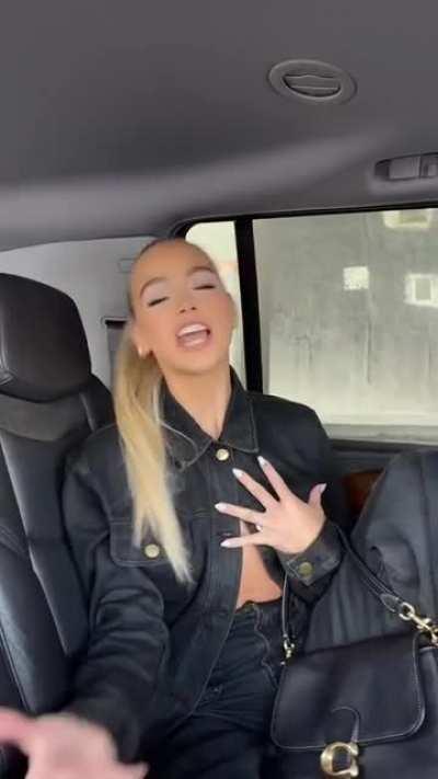 Backseat in her Coach outfit