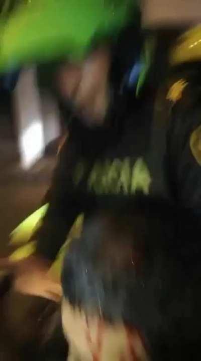 Police drags Human Rights staff after beating him.