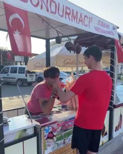 Turkish ice cream seller vibes to an Arabic song while serving his customer (who has autism)