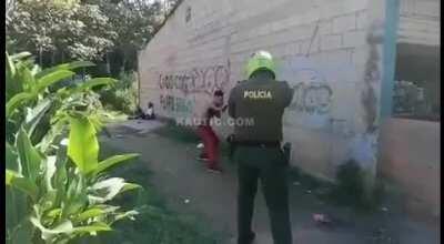 Columbian Police Officer Shoots a Man For Brandishing a Machete