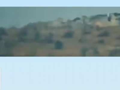 Undated footage of Syrian rebels using drones and artillery