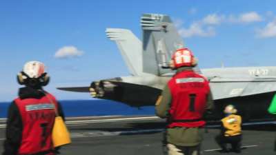 U.S. Navy F/A-18s operating on a U.S. carrier