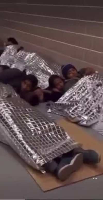 Leaked footage from inside of a ICE detention facility near Houston. No beds, no bathrooms, hundreds of men and women in one combined cell/room. The A/C is permanently kept on max to freeze people.
