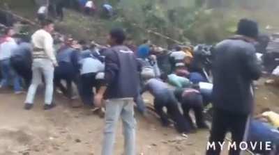 It took the whole village to rescure weekly beer delivery truck gone off cliff