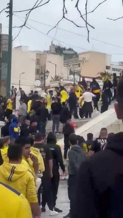 Israeli fans of an Israeli football team attack a Palestinian while attending a match in Athens, Greece