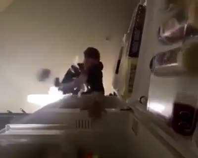 Guy fall off fridge