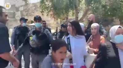 The Israeli occupation forces assault Palestinian women in area of Lion's gate, and prevent worshippers from entering Al Aqsa mosque.