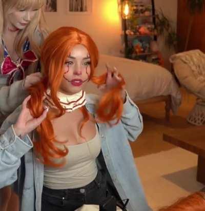 Rae putting her cosplay together