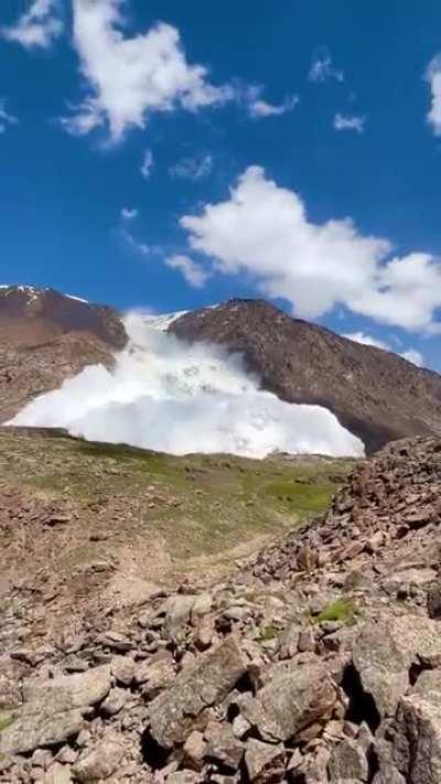 Unbelievable footage captured by tourists. Avalanche from the Tian Shan mountains in Kyrgyzstan