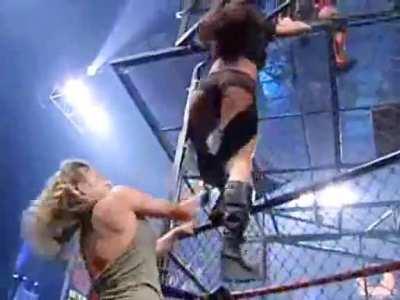 Gail Kim gets pansted by Jackie Gayda with assistance from AJ Styles