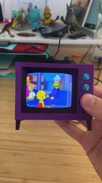 I designed and printed a working Simpsons TV. Plays the first 11 seasons at random without internet. Knobs work too!