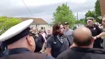 BETHEL, Ohio - while getting yelled at by an angry mob of Trump supporters, protestor gets PUNCHED IN THE BACK OF THE HEAD right in front of multiple police officers... who do nothing.