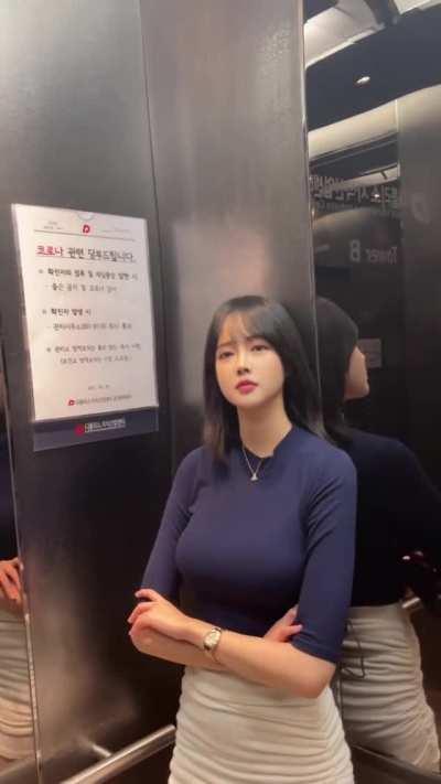 Busty elevator girl