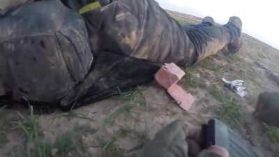 ISIS Fighter shot through lung as he retreats, comrade hides behind his body (*repost from a few years ago)