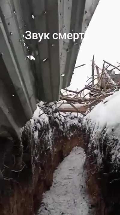 Ukranians being hunted by drones on the frontline. Caption translates to 