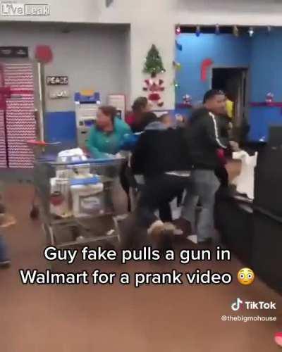 Guy pulls a fake gun in Walmart for a âPrankâ video.