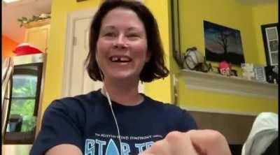 Sister reacts to gift from brother with a sense of humor