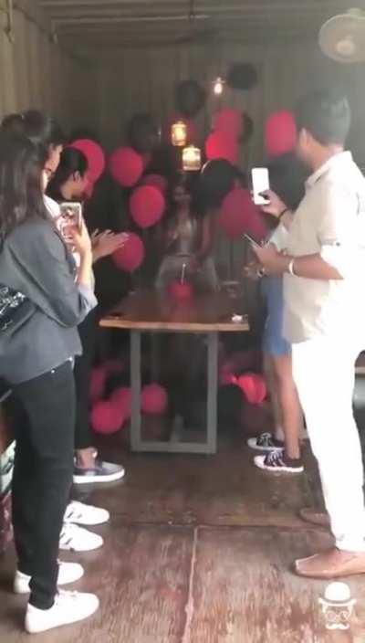 Lighting a birthday candle