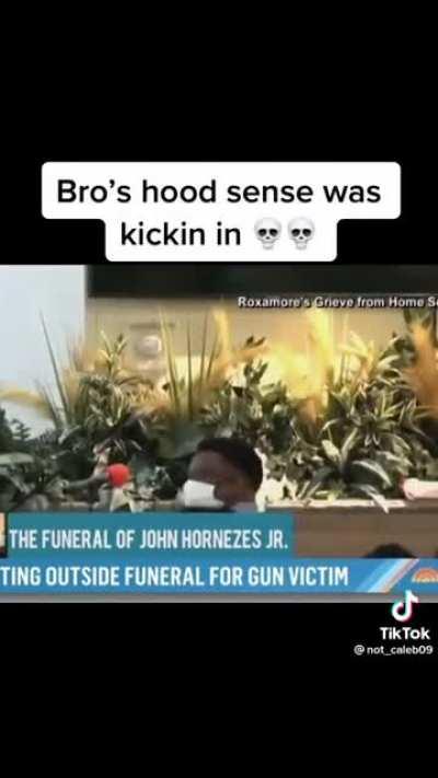 mf got a ski mask on at a funeral
