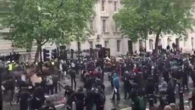 People are saying protesters knocked an officer off his horse. Here's what really happened.