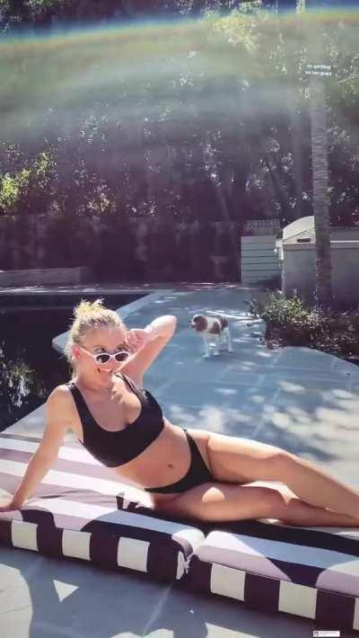 In black bikini by the pool